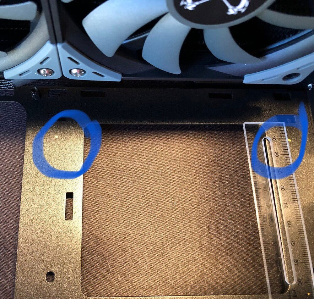 Marked holes needed to lower PSU shroud about 10mm