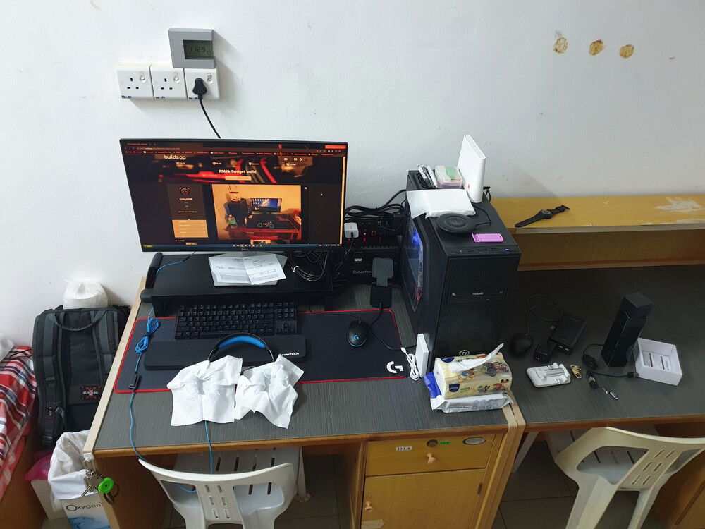 Currently, space in the college hostel room is pretty limited, so I have to temporarily reduce my secondary monitor and spend the last budget on the monitor stand (which has a USB hub beside it) to extend the spacing.
Damn, that's a lot of stuff (ignore the clock btw)