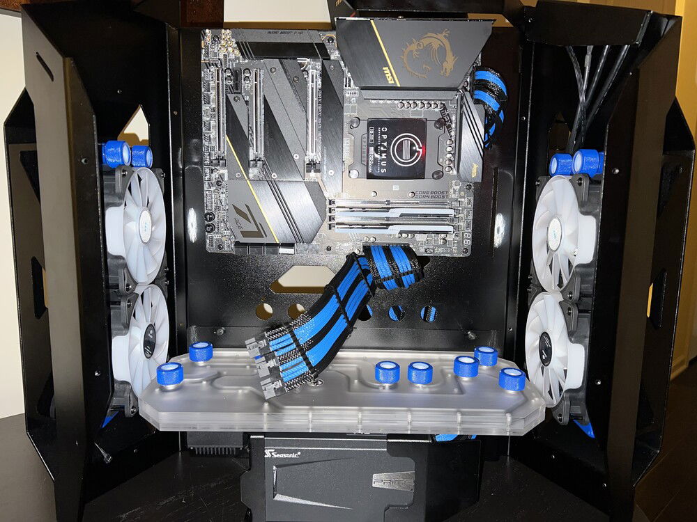 Motherboard mounted and custom cables from Titan Rig (Mod-One) installed. Good match to the fittings!