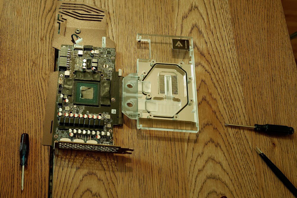 safely removed the stock cooler, now placing the barrow block.