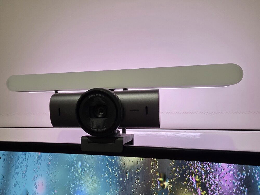 Added a Litra Beam LX light bar in 2025. Love it for screen synced bias lighting at the rear, and the front lights up of course of when streaming happens. Main webcam is a MX Brio 4K, and there's a C922 mounted on my sim rig, pointed at the pedals.