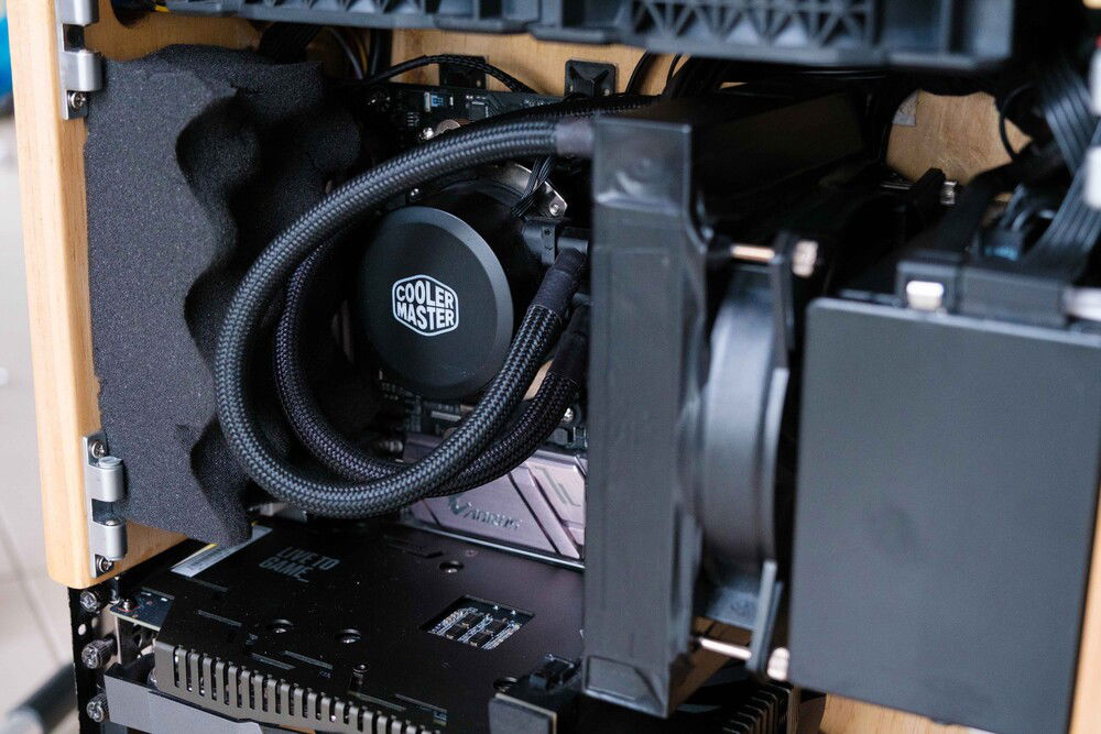 Excuse the tape - Wanting to 3D print a proper shim to mount the cooler to the PSU + block the air gap, but this'll do for now!