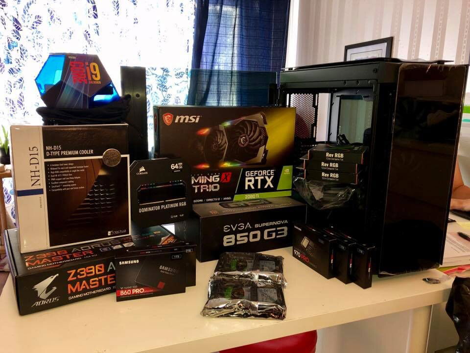 The obligatory parts pile pic (showing the 2080 Ti and Aerocool Rev RGB fans that used to be in this build back in 2019 when I built it initially)