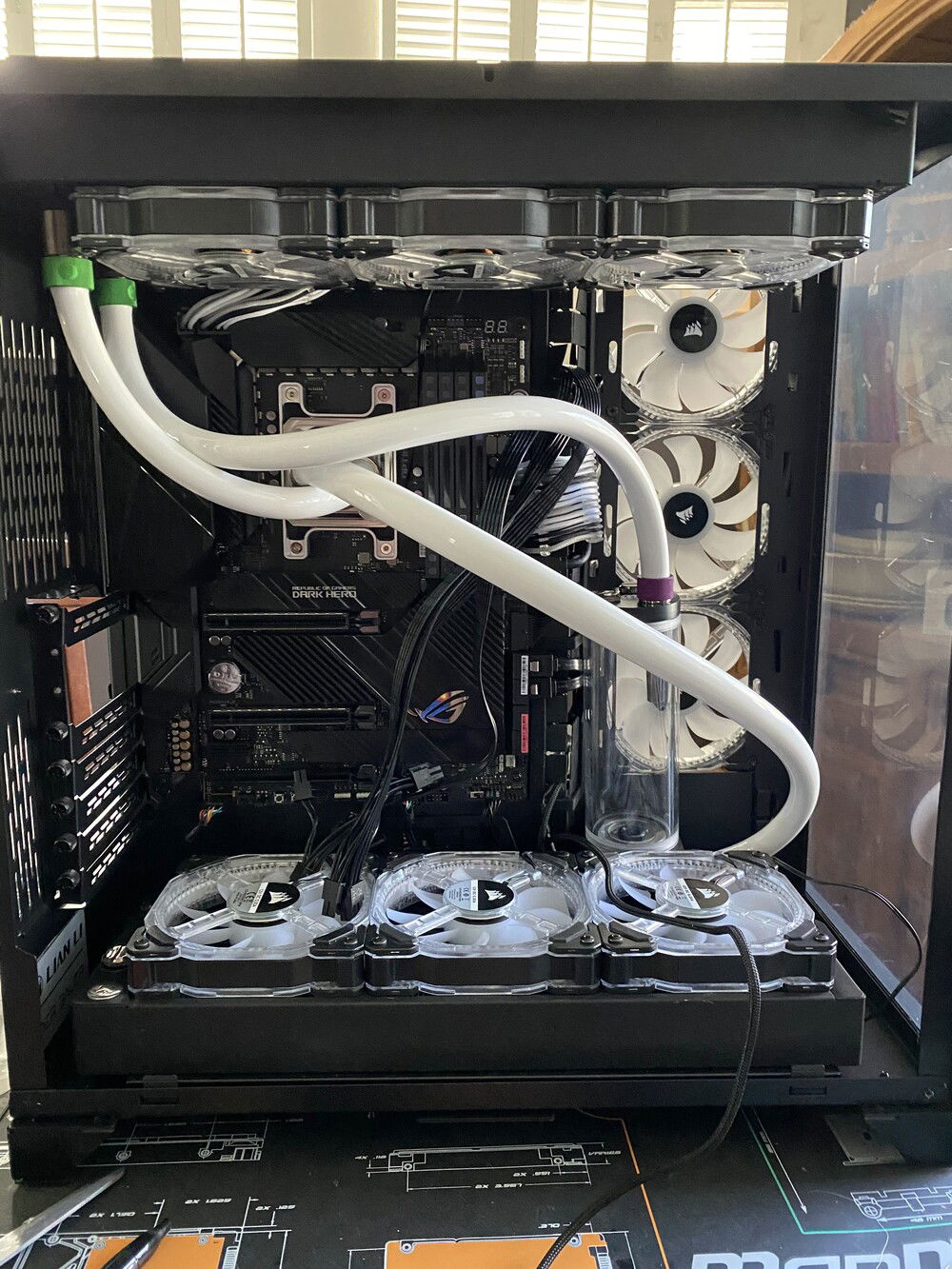 While I waited for parts to be released like the active backplate and the distribution plate, I decided to put together a temporary soft loop using my old DDC pump and some new Primochill 16mm OD soft tubing. You can see I'm using 9 HD120 fans here which changed in the final build.