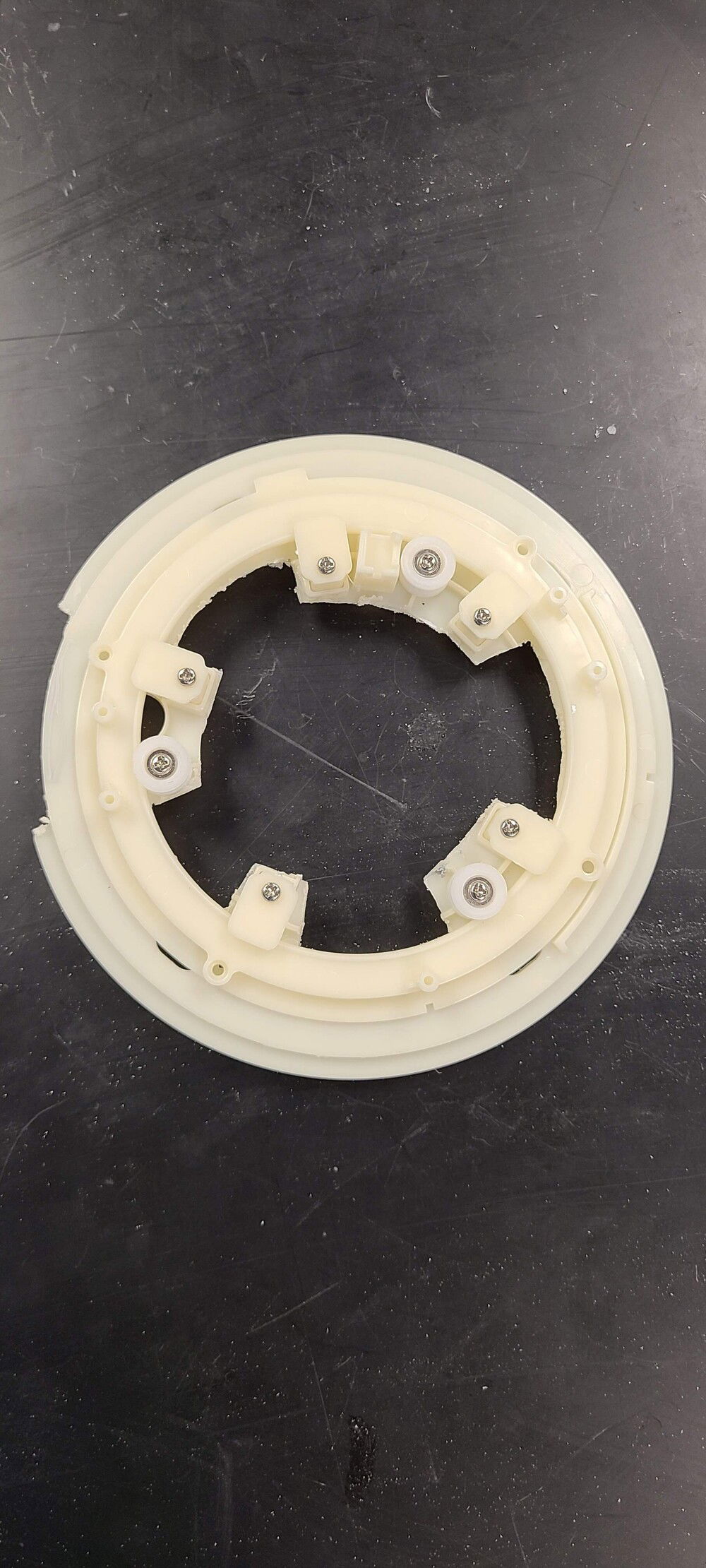 This is the piece that holds R2D2's head on.  It had a tiny hole in it.  Now I have room for cables and air flow.