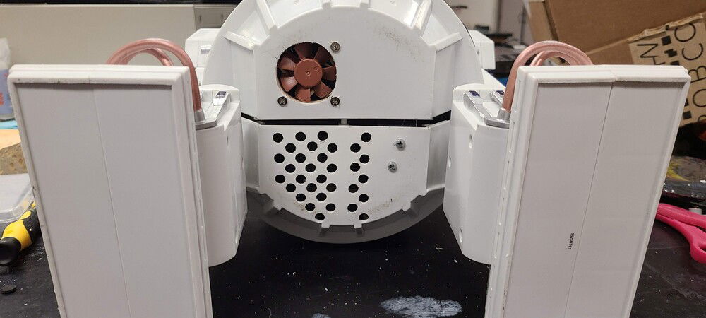 Additional Air Flow modifications.
Fan was first. But I needed more air flow.  The right side has the Motherboard mount attached to it.