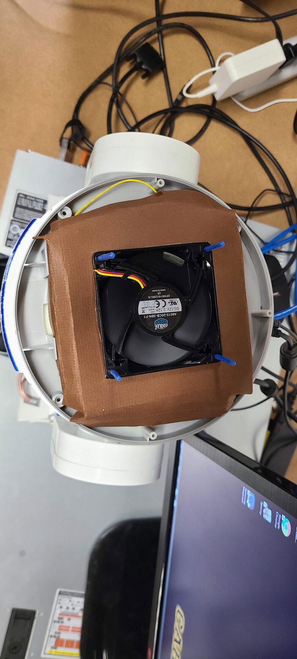 Shroud around Cast fan to help draw the air.