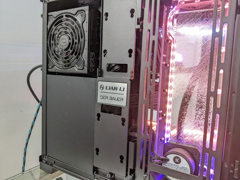 My custom cables didn't transfer well to this case... so I put an acrylic panel over the open area and used the included central cable management/SSD bar.