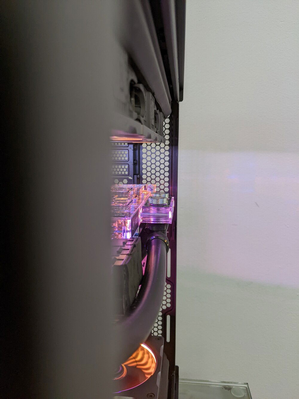 Lian Li did a mm perfect job giving just enough clearance for the tallest of GPU blocks. The EVGA FTW3 and Asus Strix should both fit with the vast majority of water blocks (mine is Bitspower).