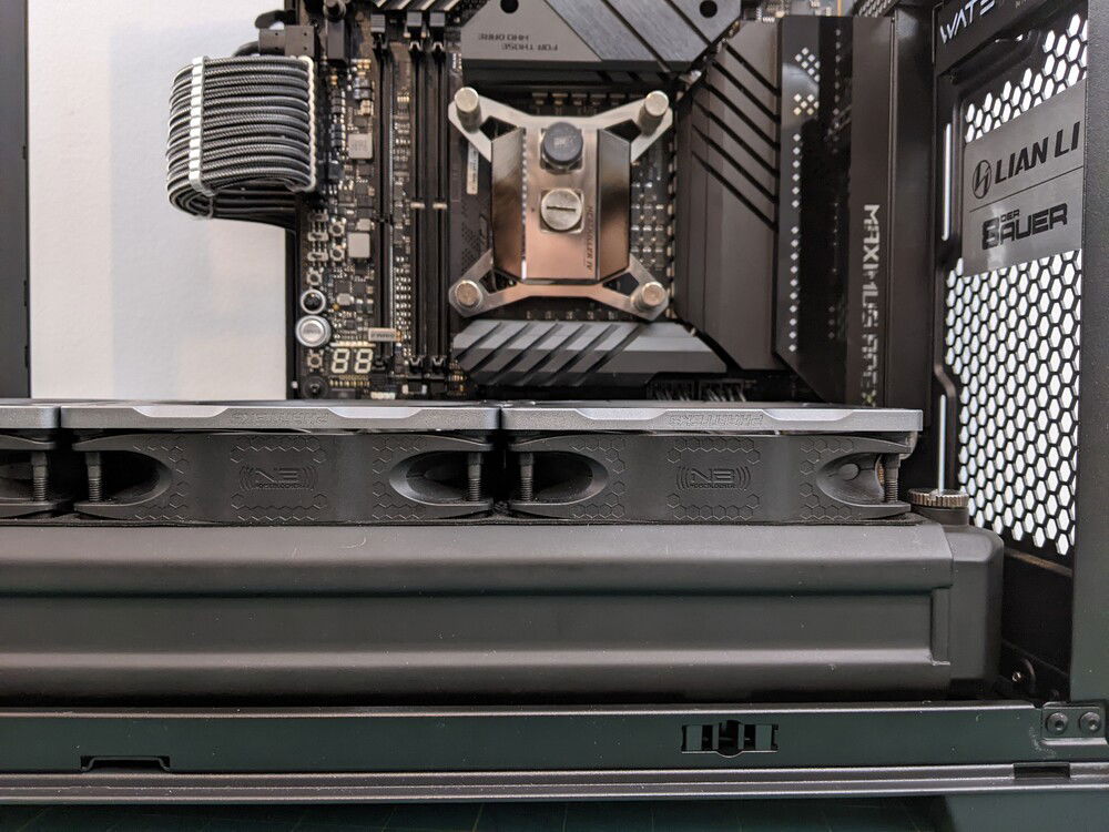 With that said... there are some clearance issues to be aware of. With thick rads (45mm+) you will have to use highly flexible cables (stock, Modflex or SFF) for your CPU power.