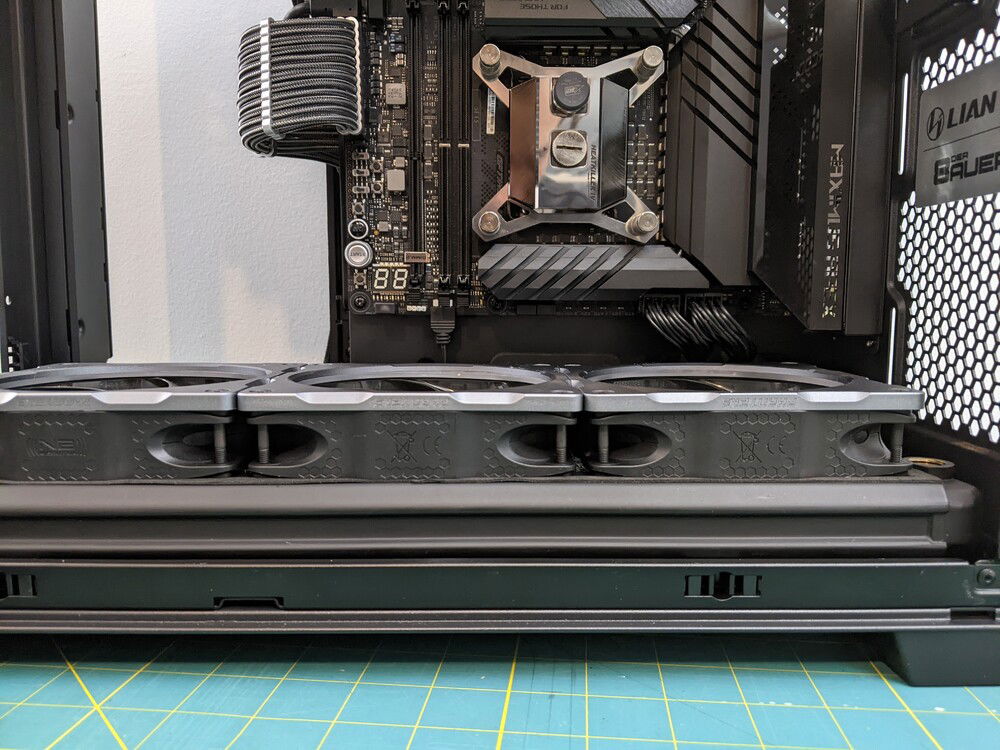 Going with a ~30mm radiator (above the mobo) will solve both of these issues.