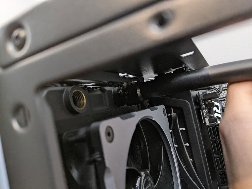 Please note, you will need an extension fitting or two to clear the side GPU bracket