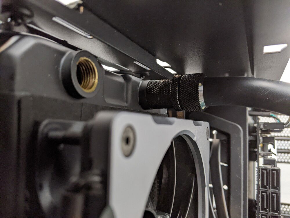 While the rad does have vertical adjustment, putting it lower (or higher) makes it a bit difficult to remove (it's best in the middle).