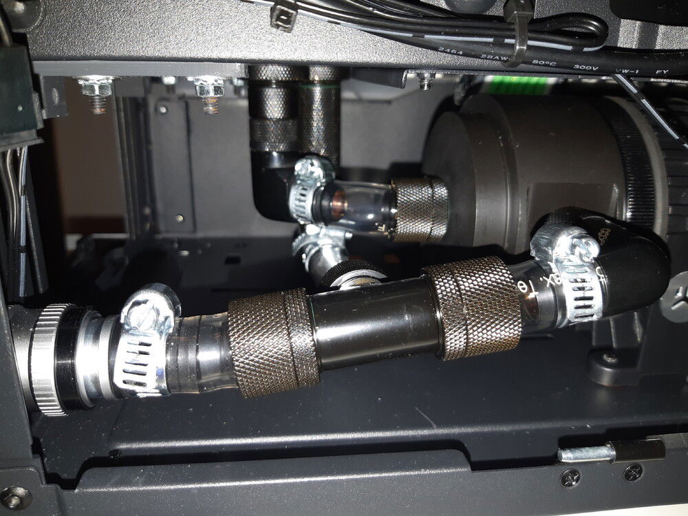 The splitter connects the pump outlet to both the drain valve and the rest of the loop.