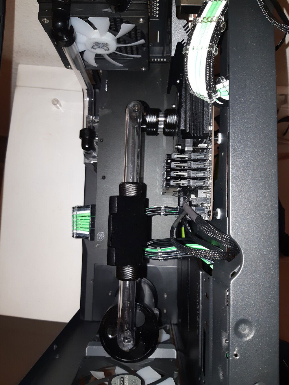 Last check of the alignment from the top. 
Pay attention! Phanteks MB mounting plate is not parallel to the case sides!! There is a barely visible misalignment, since they created a column of space 2 cm wide behind the plate (at the corner with the back-panel of the case) in order to route the 8+4 ATX power cables.
