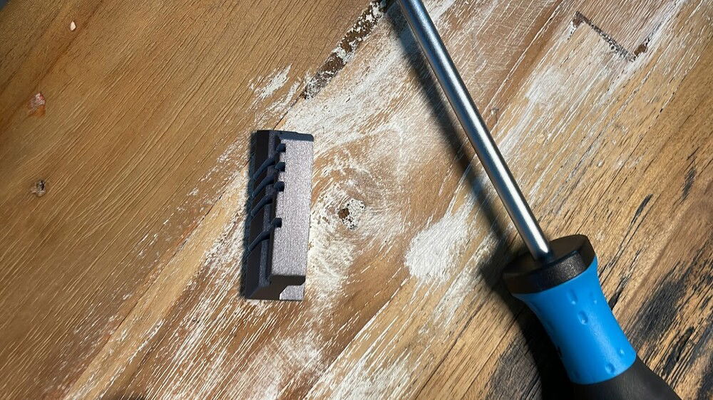 Sadly to get the AIO to fit we had to trim the heatsink on the VRMs...