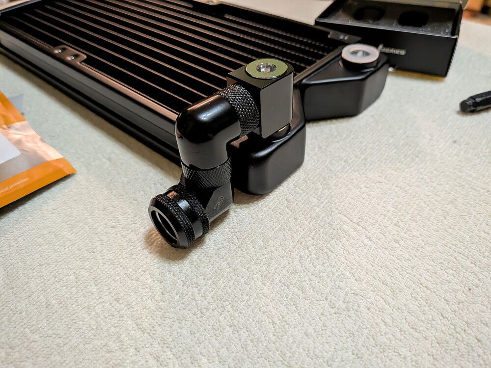 Snake of 90 adapters was need to connect side radiator