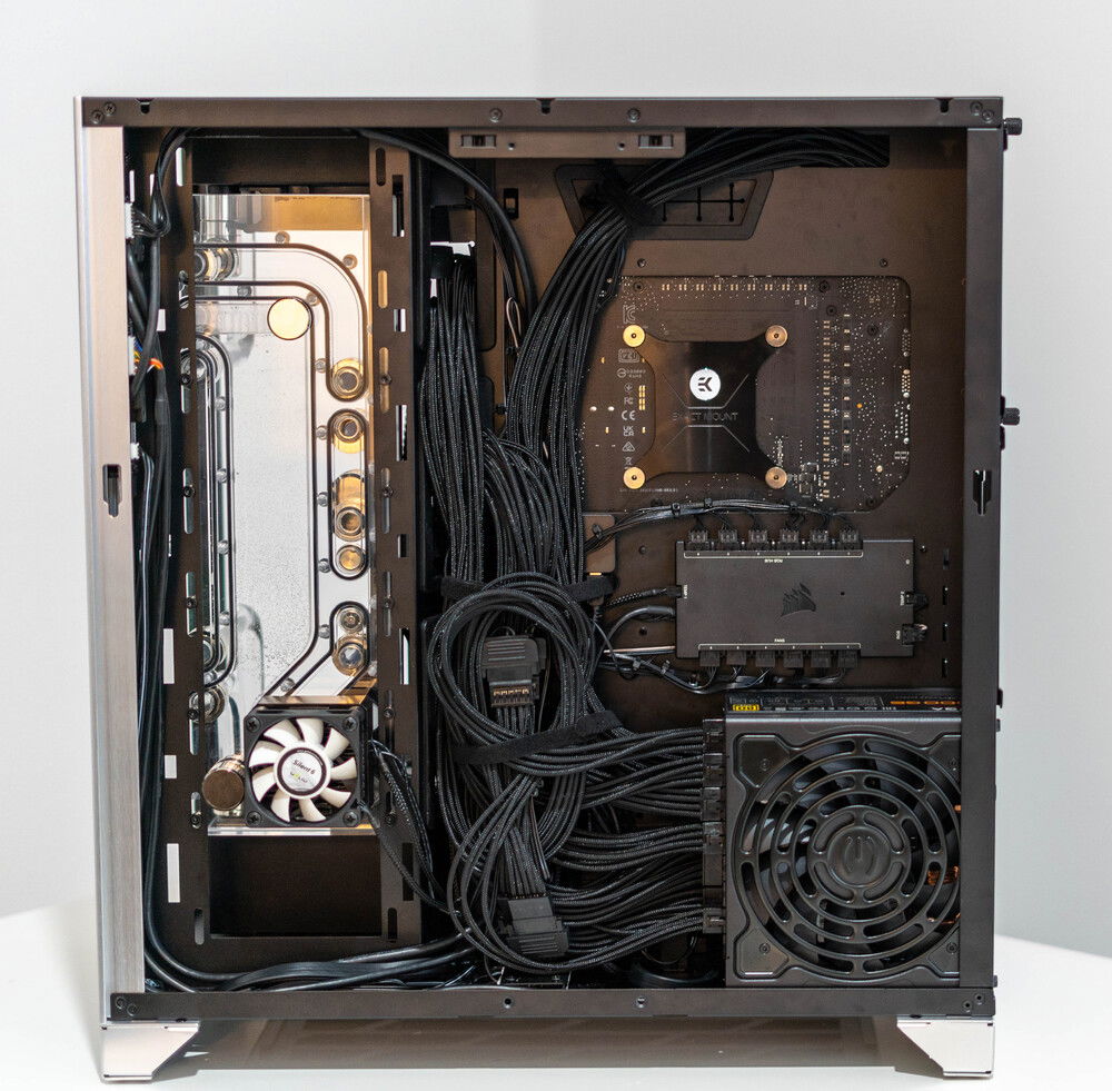 I initially tried an older EVGA P2 1000W PSU, but swapped it out for a smaller G6 1000W PSU to leave more space and make it easier to install the channel cover without moding.