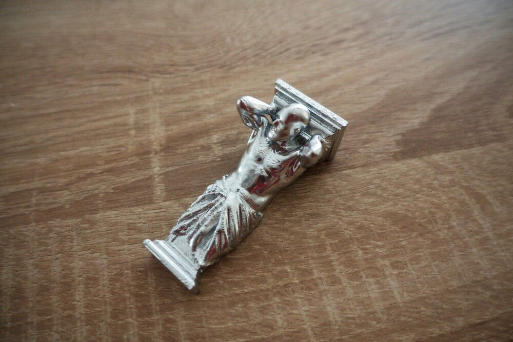 3D printed GPU holder in chrome.