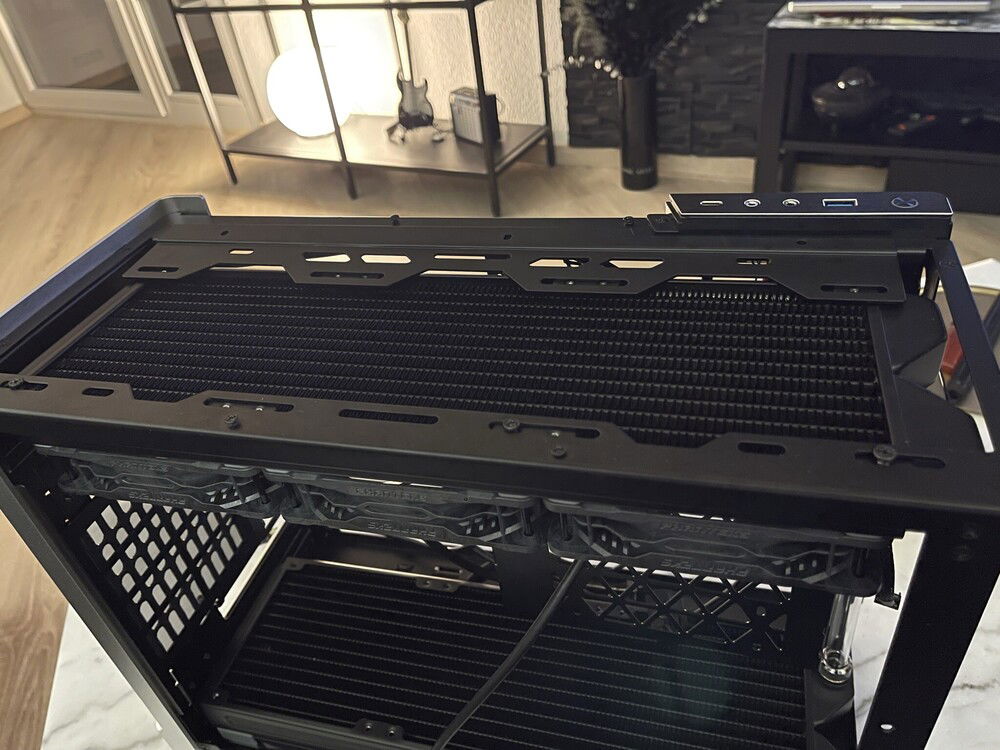 Mounting the top radiator with fans already attached and doing the first hard tubing run to connect the rad's. This took a while...