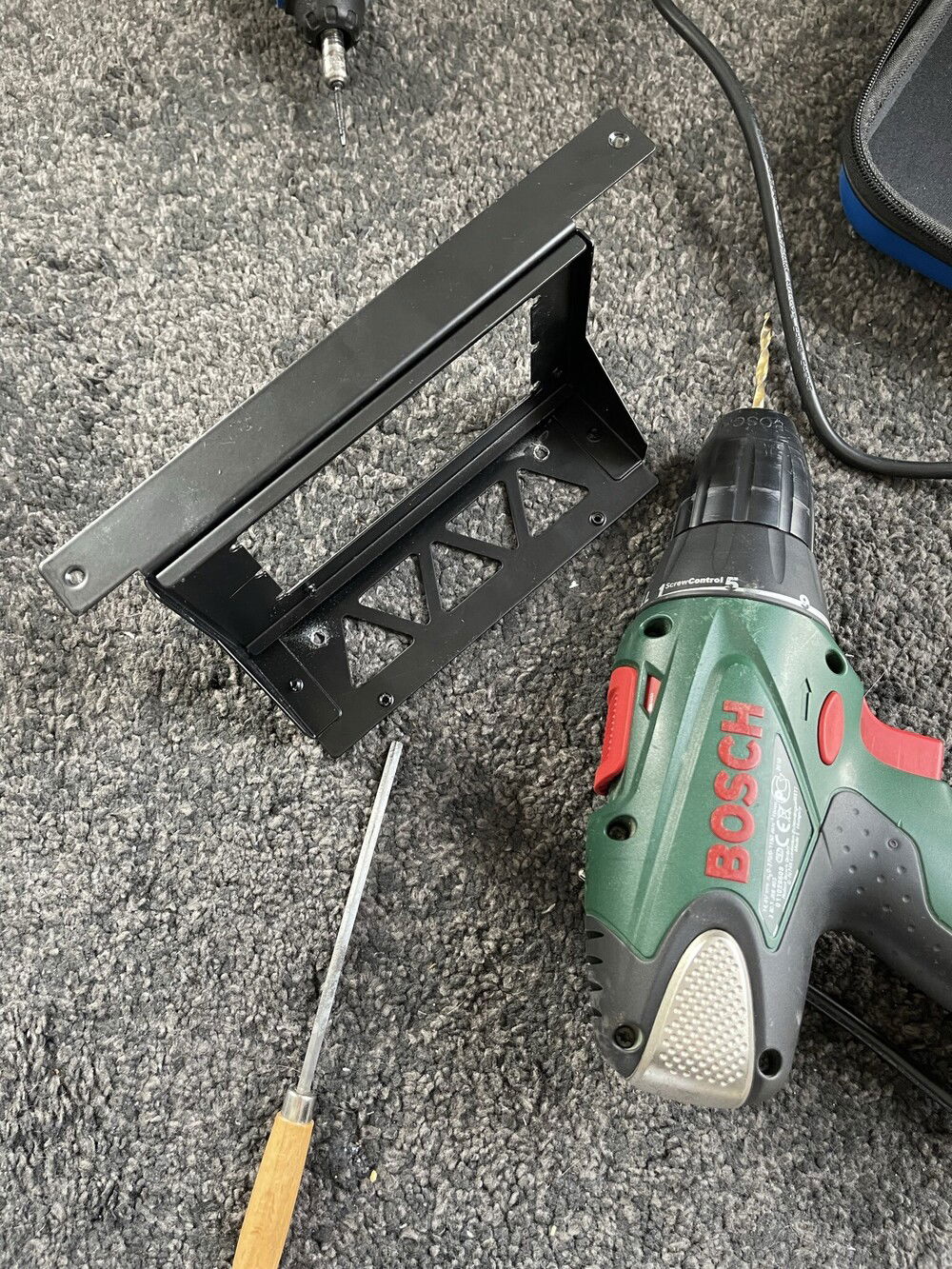 I had to drill some holes to mount the res/pump combo to the PSU bracket.