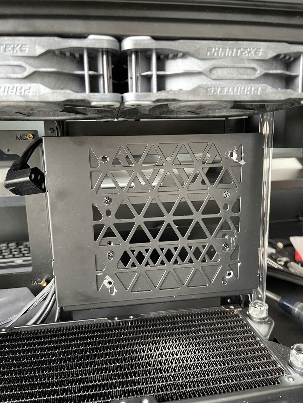 I had to drill some holes to mount the res/pump combo to the PSU bracket.