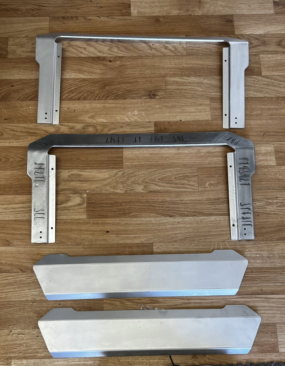 stripped alu and saltwater etched this is the way, seagate, intel, rog, gskill, ekwb and xcc in mando text on one of the panels