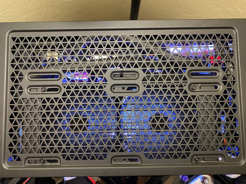 Hard to see but pictured is a top down view of the 240mm rad showcasing the two stealth runs. 
One run  is from the left side of the 240mm to the distro rad port.
The other is a long U turn run from the 360 rad to the other distro rad port.

When I take my loop apart for maintenance I’ll be sure to get a better shot of this from inside the case.