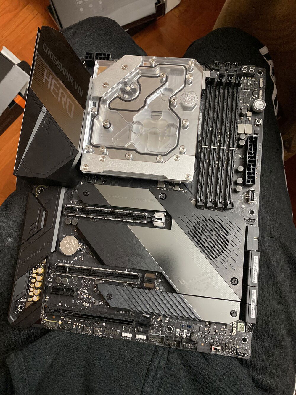 Close up of the motherboard with the Bitspower Crosshair VIII Monoblock.