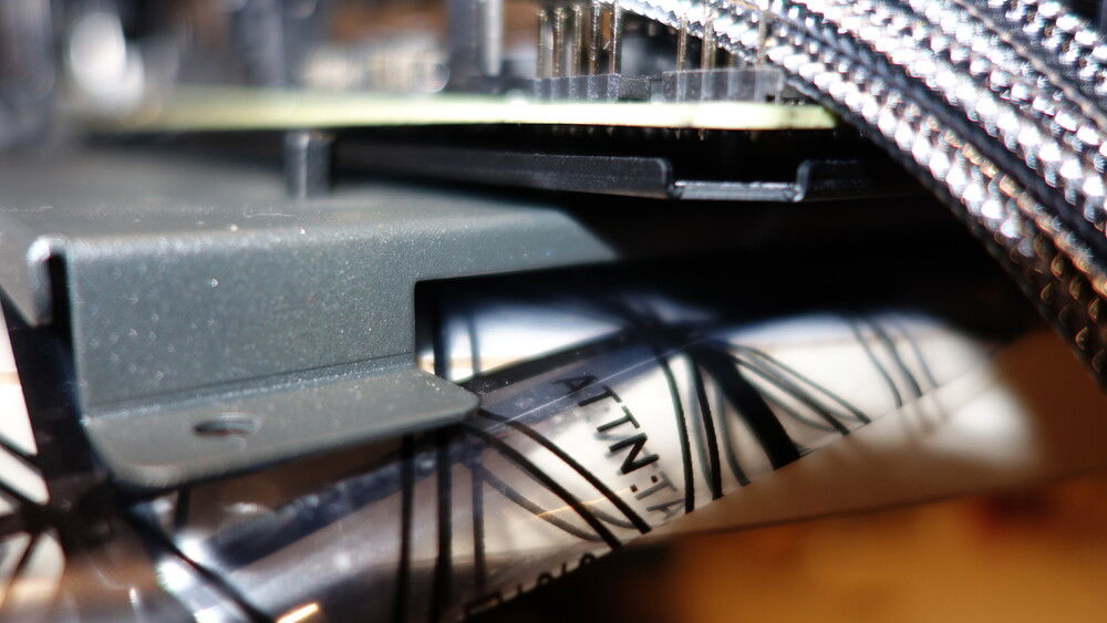 the extra thick back plate on the mobo required taller spacers