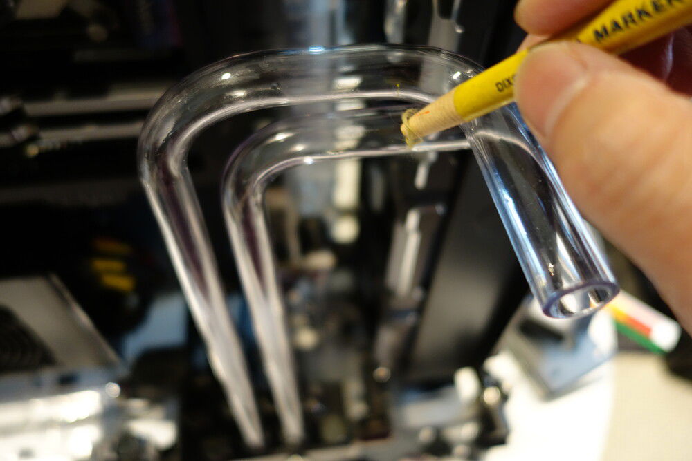 trying to make the CPU inlet run parallel and narrower bend. discovery: yellow wax markers are great and rub off after heating tube