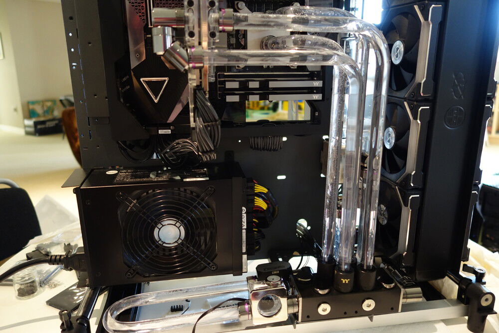 filled with coolant, power up pump... and nothing. After dejectedly wondering if a combo reservoir/pump was a bad idea for maintenance, the pump suddenly starts up after about five minutes and sprays water out the top of the reservoir and the radiator bleeding screw