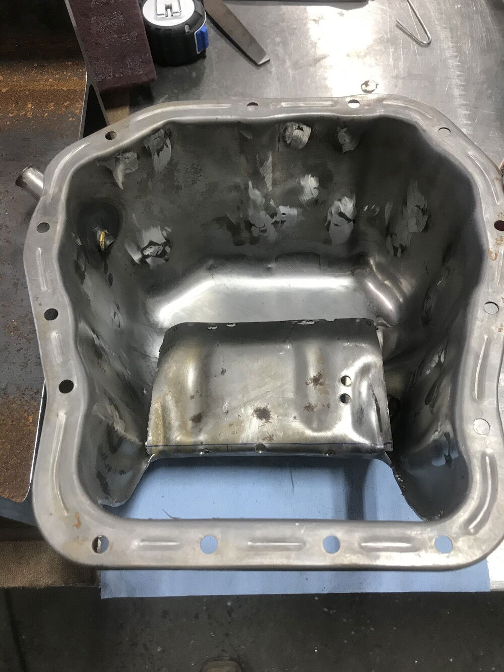 Oil pan being modified