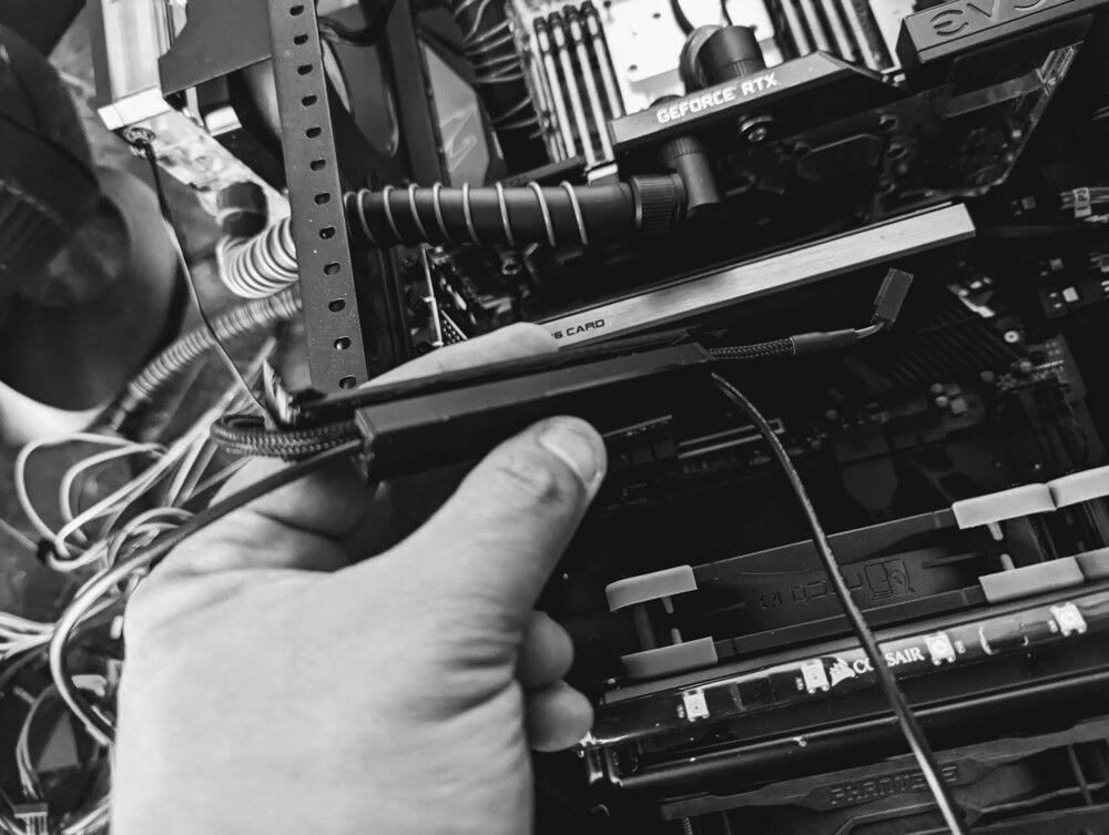 Custom-designed PCI brackets with cable runners (April 2022).