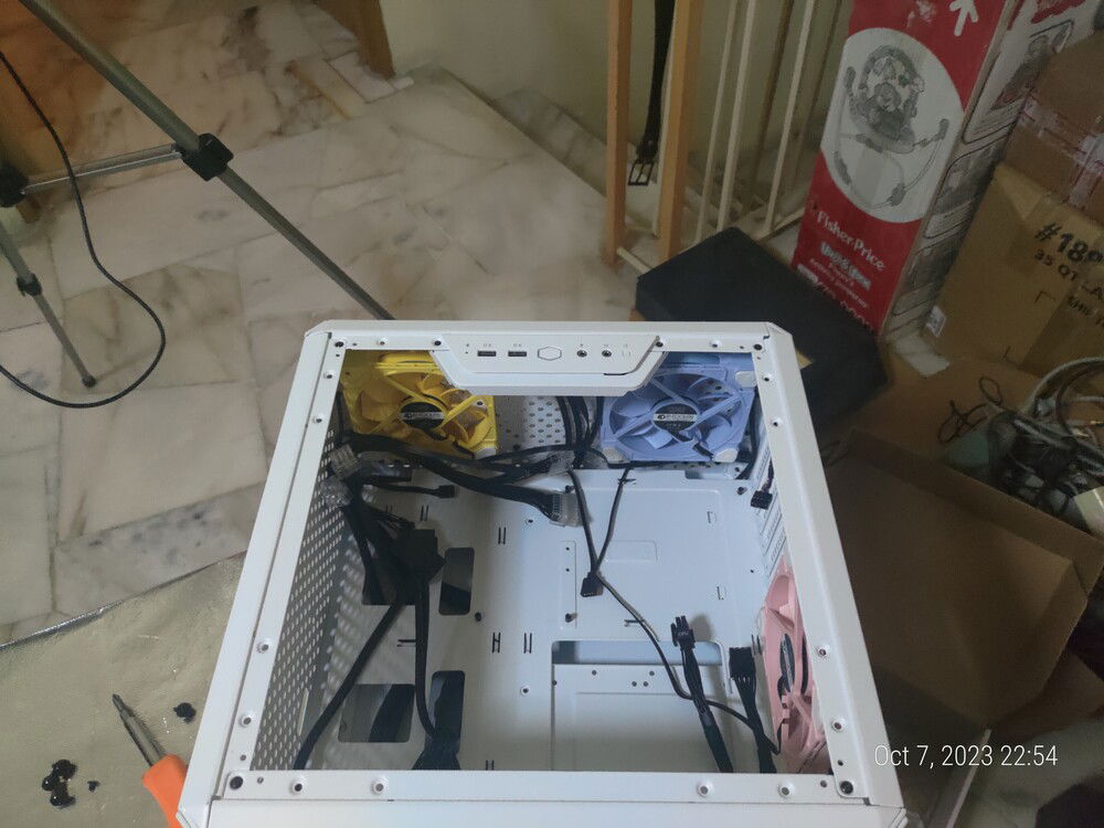 The bottom intake fans. Yellow to the front and blue to the back