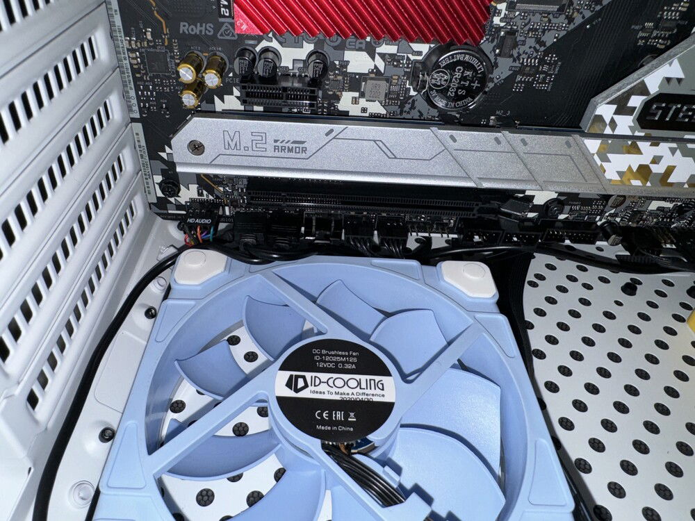 ARGB extension cable connected to the mobo. I'm not going to want to deal with that connector once all the cards are in place.