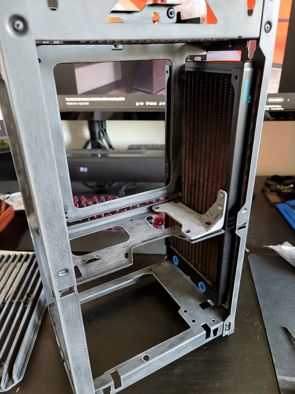 Rear radiator test fit with support bracket. Motherboard tray was plenty secure after the frame cuts but the horizontal cable tray divider was floppy without the support bracket (especially with the pump weight).