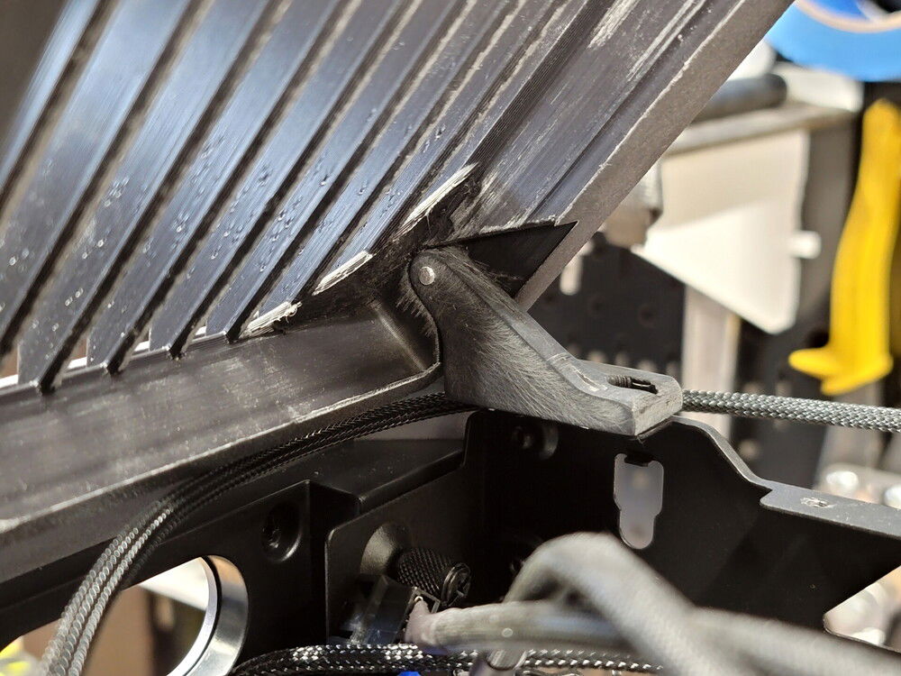 Top panel test fit with custom hinges. Pivot point had to be moved up significantly higher than the original to prevent the thicker top panel interfering with the rear panel when opened.