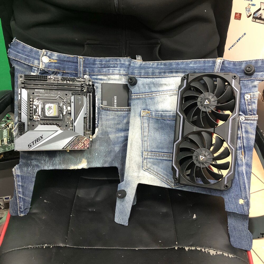 Both front and back panels covered, sewn and tested with an ASUS RoG Strix Z390 ITX motherboard, a Samsung SSD and Antec's PRIZM Matrix 120 attached.