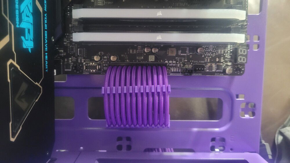 Purple sleeve extensions for visible cables