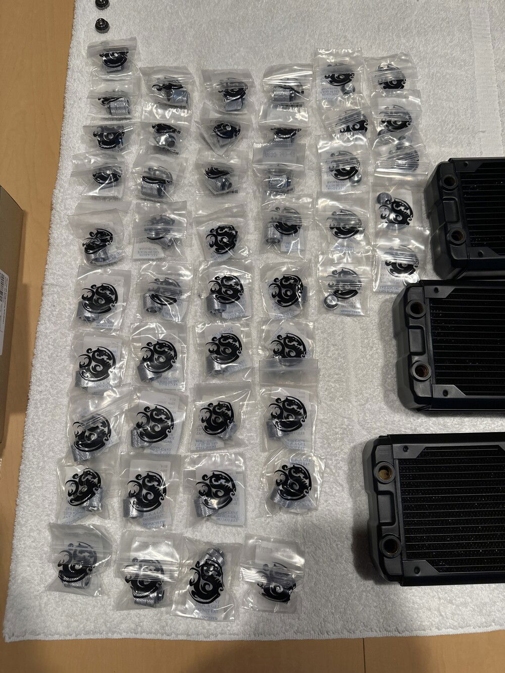 37 Bitspower 3/8 x 5/8 compression fittings, 10 Bitspower stop fittings. I have not bought any angles yet. Pass through fittings are inbound.