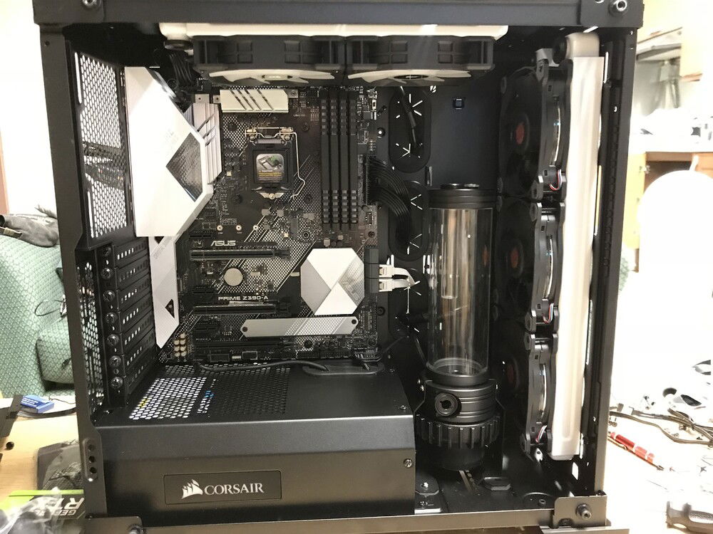 Based on the size and type of brackets available, the pump/ reservoir had to be mounted on the bottom of the case.