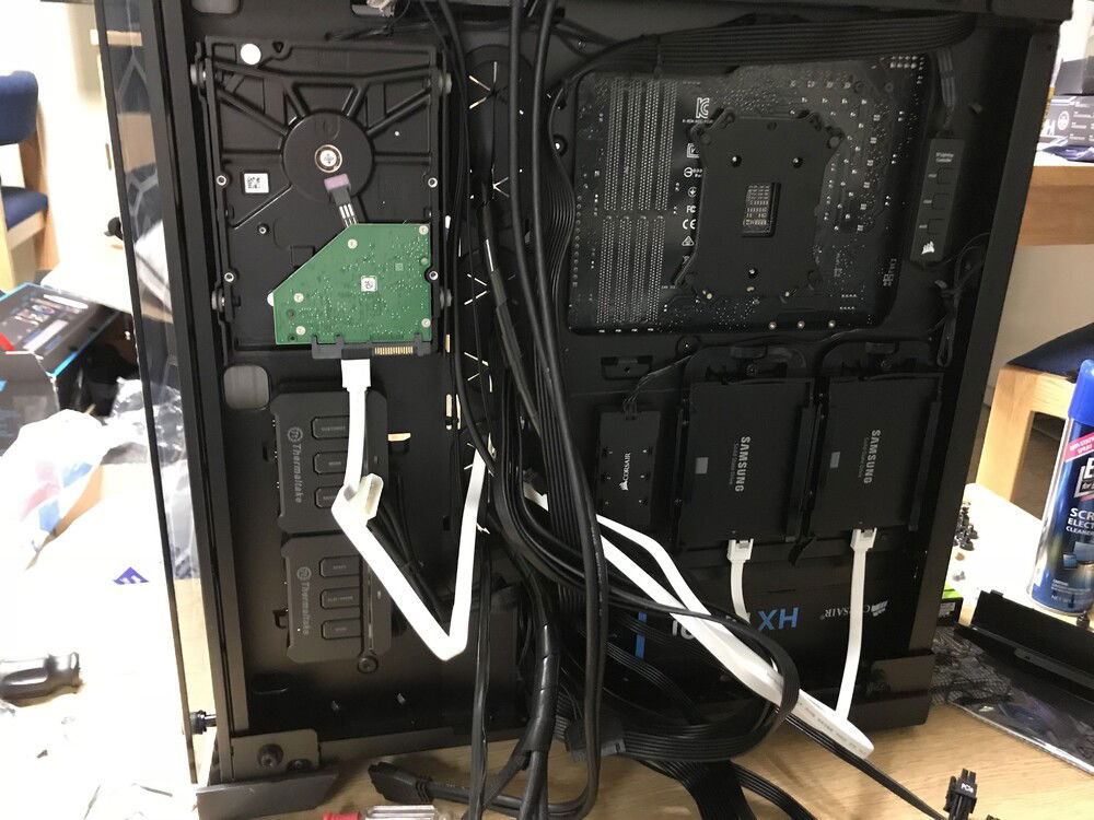 Cable management in the Corsair Crystal 570x is not easy! The entire case has tempered glass, so even the back is visible.