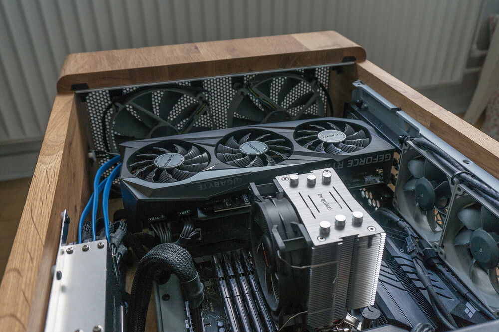 The Gigabyte RTX 3070 GPU is a much better fit for the case both visually and performance wise.