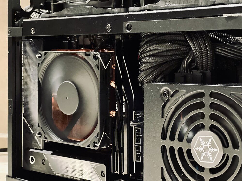 The Noctua fan was a perfect replacement for the Thermalright cooler. Their chromax model is a high-speed fan, so I limited its max speed to 85% in the bios to keep noise down.