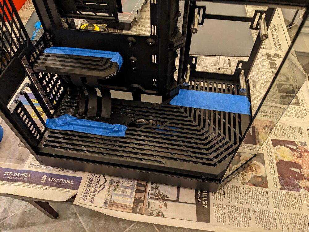 Case prep for drilling/cutting - keep the metal bits out of the riser and case electronics.