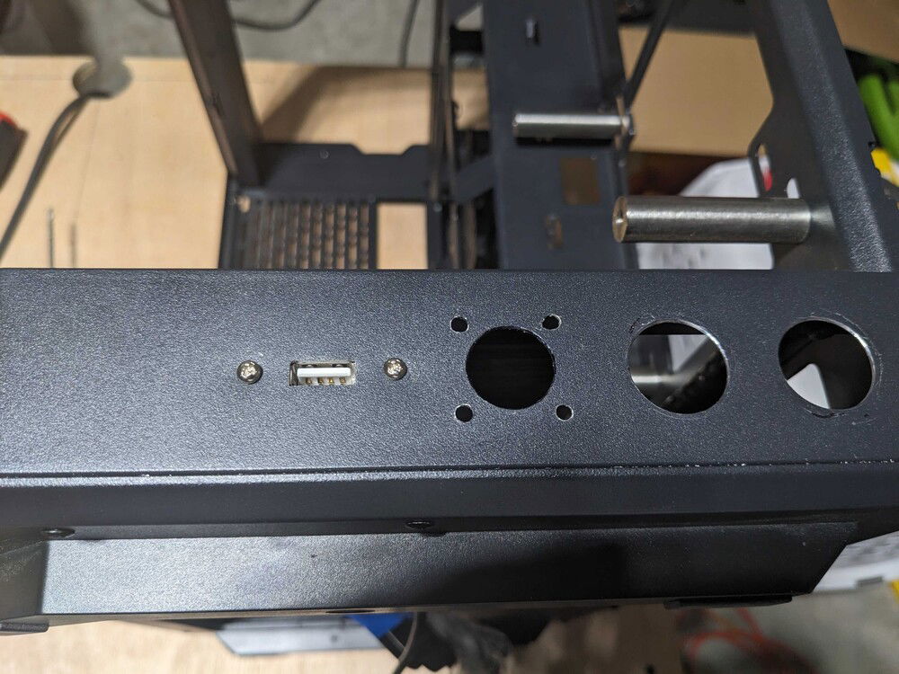 Additional hole for umbilical cable and USB port for Leakshield.