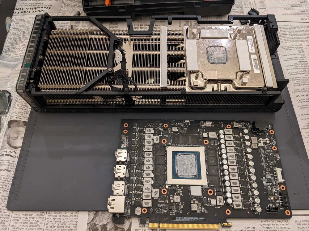 GPU finally separated.  The stock thermal pads had a death grip on the card.