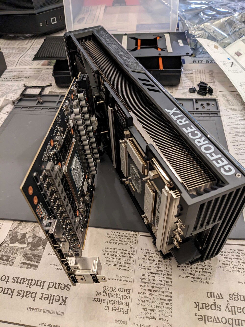 Separating the GPU from it's colossal stock cooler.