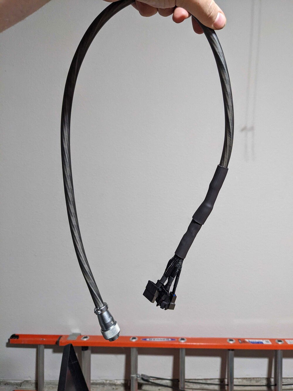 Full umbilical cable with heat-shrink in-place